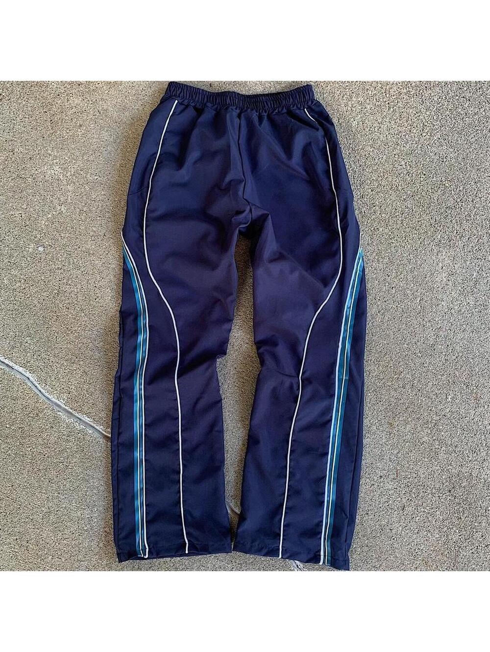 lightweight striped blue and white windbreaker pants. Wide leg opening. Size - Picture 7 of 8